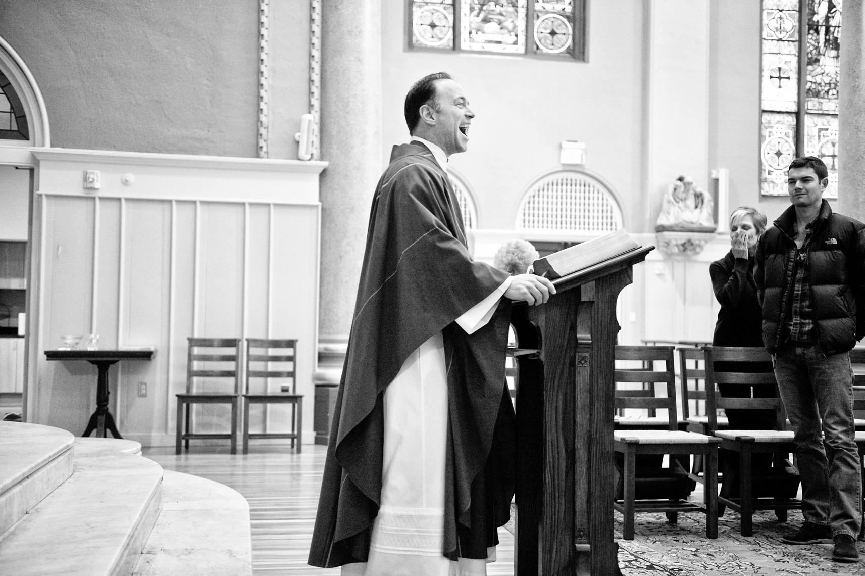 Reverend John Unni preaching at St. Cecilia Parish in Boston