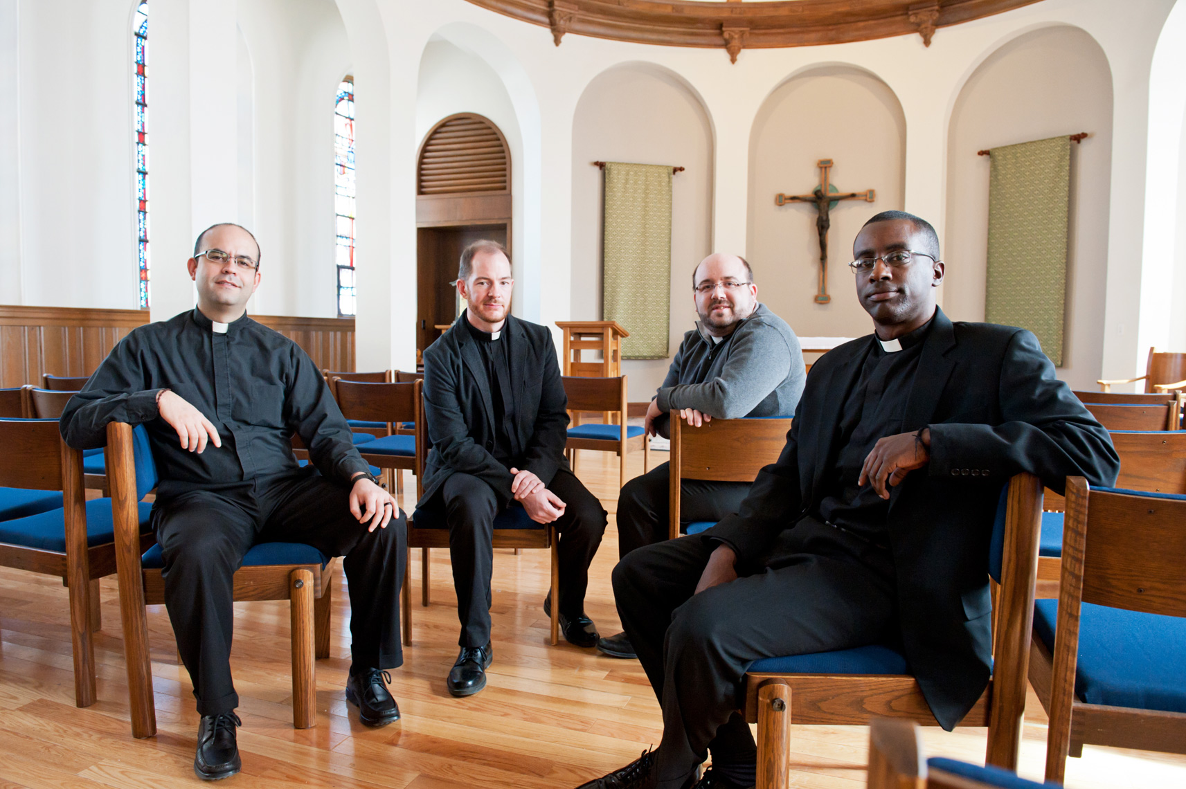 four young Jesuits in trying at Boston College for CNN story on the "Pope Francis effect"