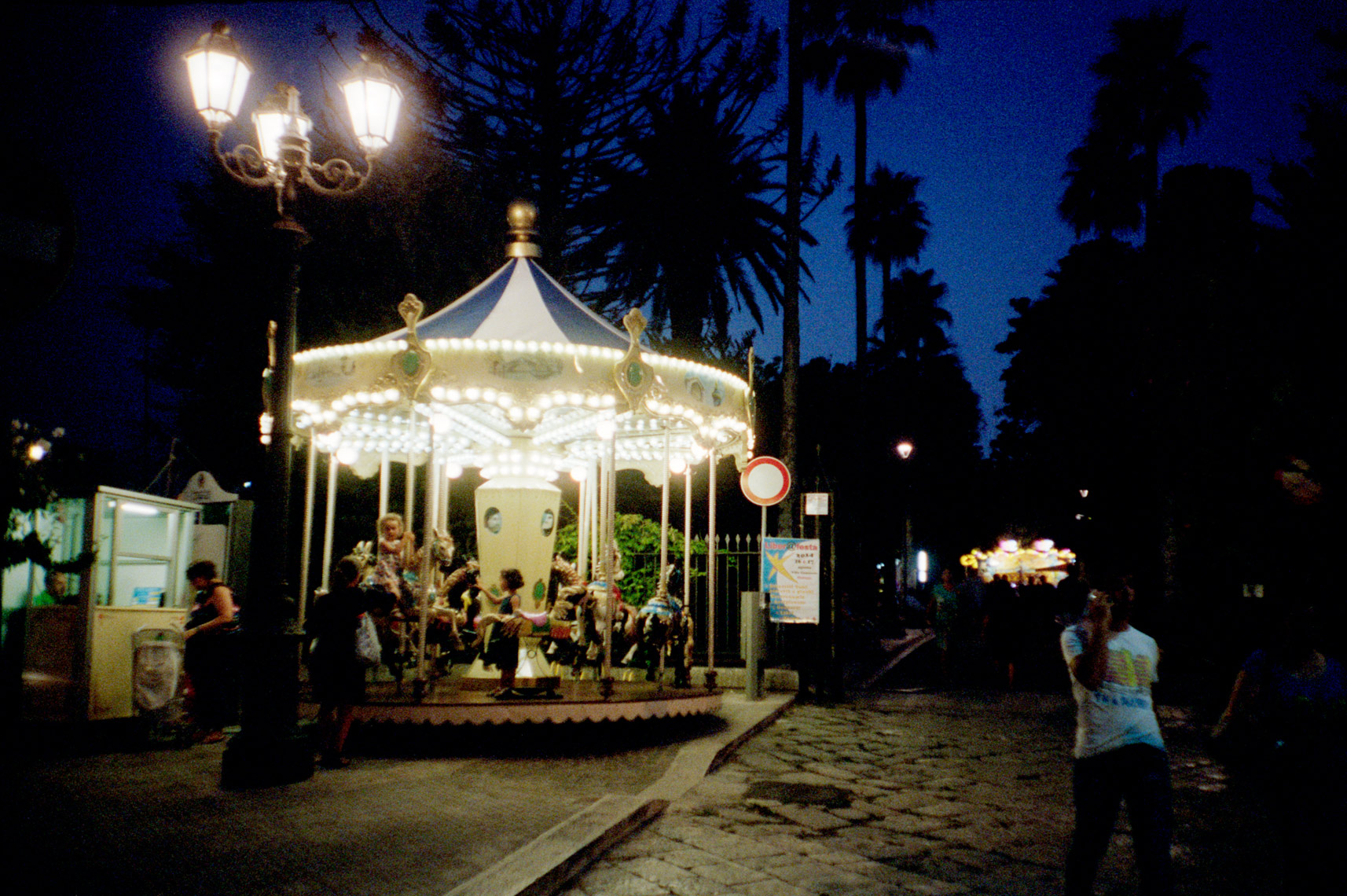 carousel at night in Ostuni Puglia Italy as part of religious carnival 
