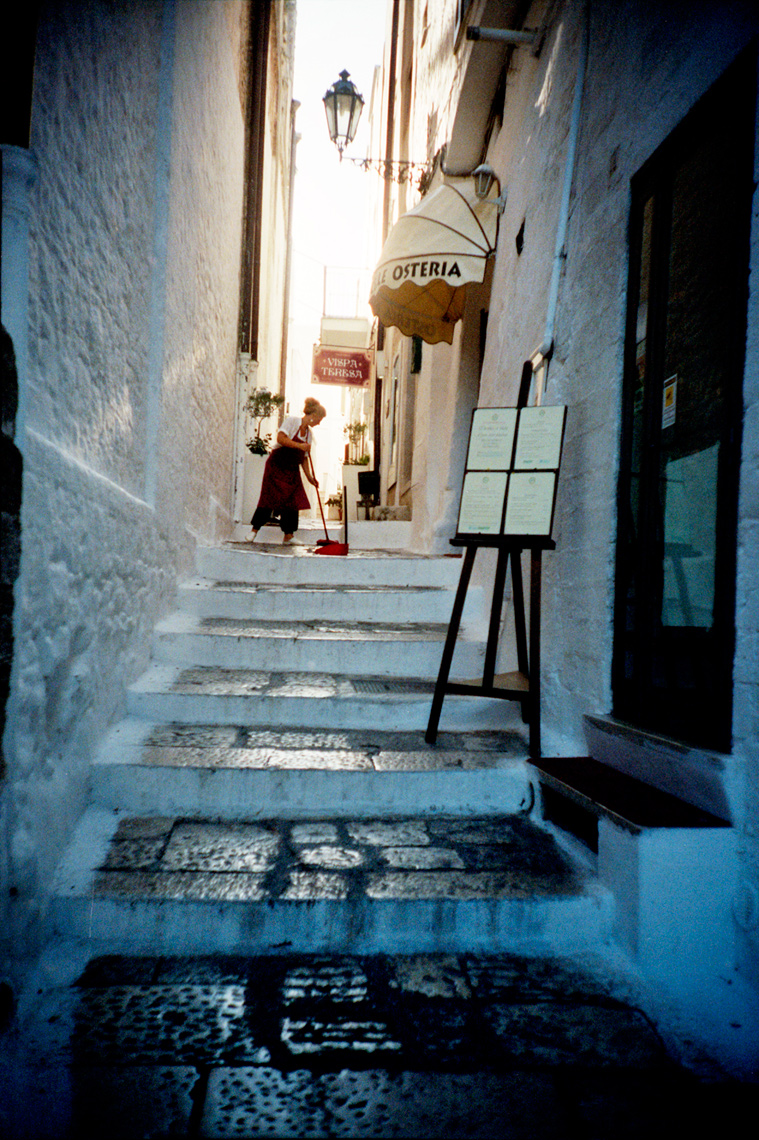 street sweeping Ceglia Messapica small village life in Apulia  